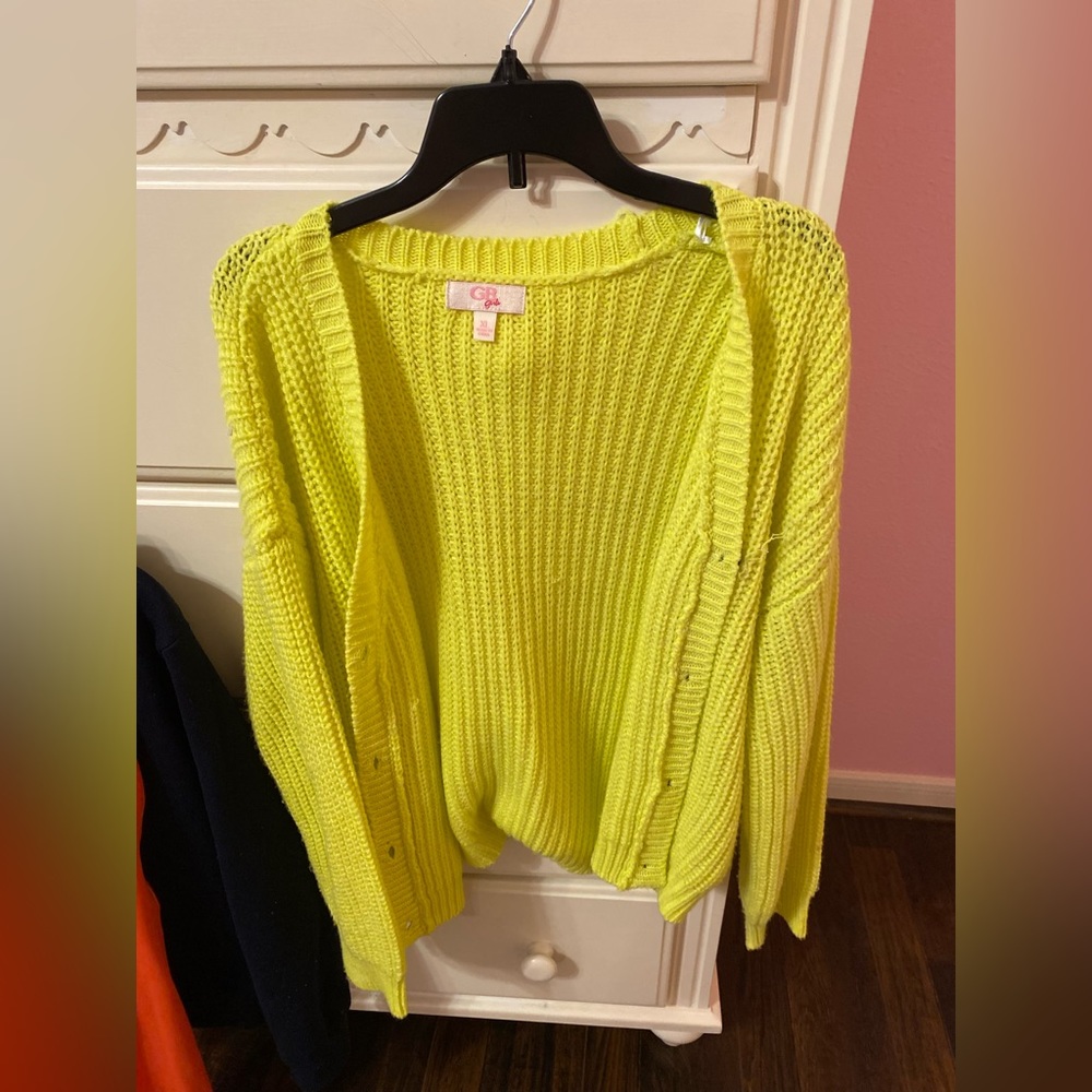 Bright yellow cardigan size XL but it fits like a medium or large